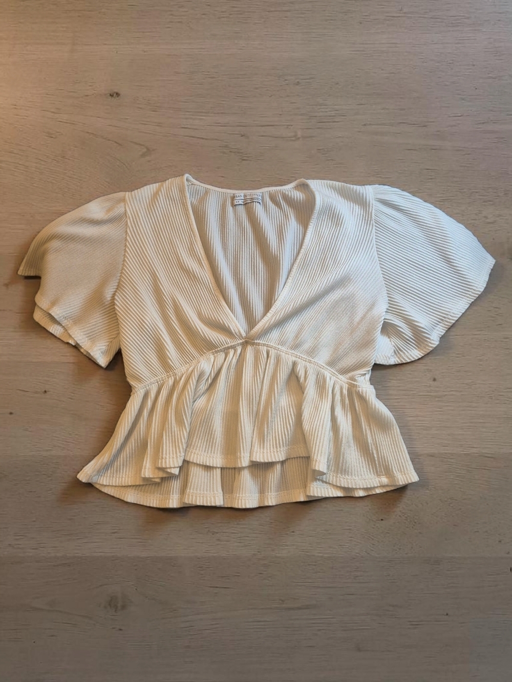 Women’s Cream Ribbed V-Neck Peplum Top